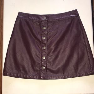 Dark purple faux leather mini skirt